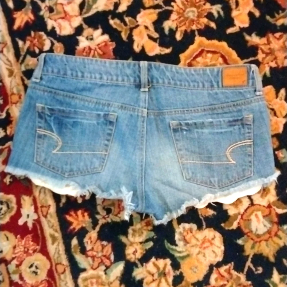 AMERICAN EAGLE- Lace Exposed Pocket Jean Shirt Cut Offs Size 8 - Picture 7 of 7